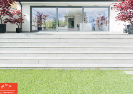 Landscaped-garden-with-aluminium-lift-and-slide-doors-in-Neasden