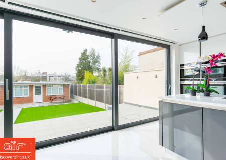 Three-pane-aluminium-lift-and-slide-door-in-Chelsea